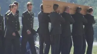 Raw: MH17 Victim's Bodies Arrive in Netherlands