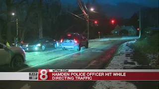 Hamden police officer hit by car while directing traffic