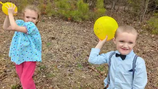 The Kids Playing with a Water Balloon after Church