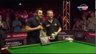 Ronnie O'Sullivan breaks his trophy at the Paul Hunter Classic 2013 Final