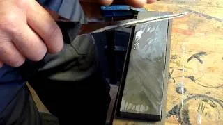 How to sharpen a knife on an oil stone