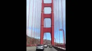 Riding across Golden Gate Bridge on motorcycle