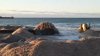 Slow Motion of the Sand being pumped onto the beach