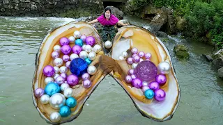 The giant clam hiding under the mud and sand, nurturing countless charming pearls, is very beautiful