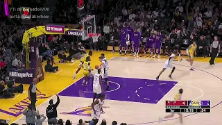 Thomas Bryant slams it down after almost losing the ball