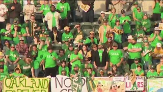 A's fans escorted from suite level for wearing SELL T-shirts