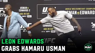 Leon Edwards grabs Kamaru Usman’s arm at UFC 278 face offs