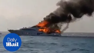 Footage shows luxury yacht going up in flames off Majorca