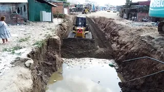 Amazing Komatsu Bulldozer Pushing Sand Coverage The Sewage And Repairing The Road