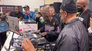 DJ Aladdin and DJ Battlecat beat juggling vinyl at NAMM 2023