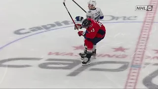 Tom Wilson shaken up after a bump from Ross Colton