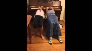 Laura & Kristi play upside down piano