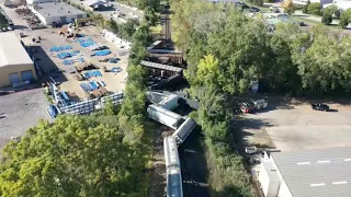 Drone footage: Train cars derail in southeast Warren