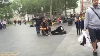 London street performer fights homeless man