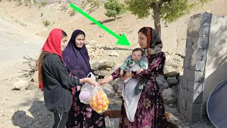"Helping Maryam and her baby by pregnant Fatima and her daughter Shida"
