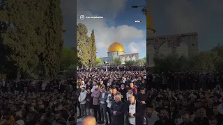 Palestinians gather for Eid Al-Fitr prayers at Al-Aqsa in East Jerusalem