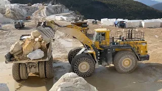 Huge Komatsu WA800 Wheel Loader Loading Caterpillar 775E Dumpers