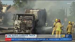 Garbage truck catches fire