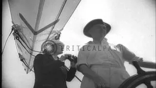 J-class yacht Ranger wins America's Cup by defeating Endeavour II of Britain by 4...HD Stock Footage