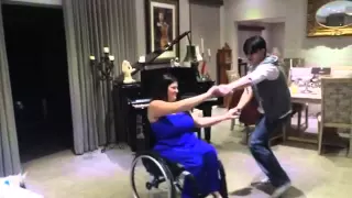 Rudi Claase wheelchair dancing with best friend Charne Hugo at home..