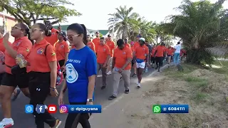 Hundreds walk to mark Occupational Safety and Health day.