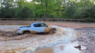 Rivian full send through mud pit of death at Uwharrie