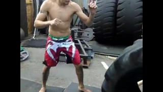 Tony Ferguson Kicking a Tire for Leg Conditioning