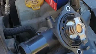 2014 Jeep Wrangler  Thermostat  and Coolant temperature sensor  change ( Check engine code P0128 )