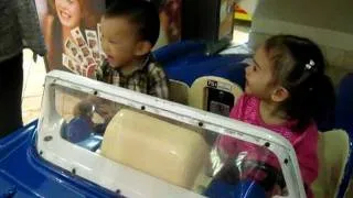 Cute Babies Riding on Kiddie Ride