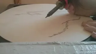 Wood burning a wolf