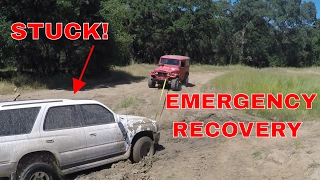 1975 Toyota Landcruiser FJ40 Rescues Toyota 4Runner Stuck in Mud Pit