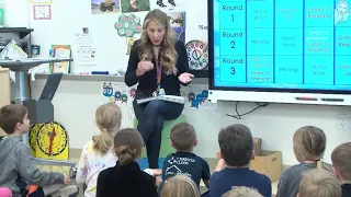 Mahomet second-grade teacher motivating students to sharpen reading, writing skills