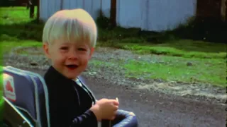 Baby Kurt Cobain kissing the camera and playing guitar - Montage of Heck clip