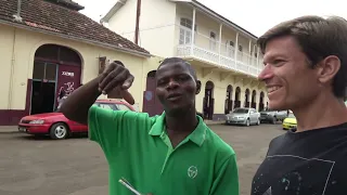 Tour guide shows me fort in São Tomé