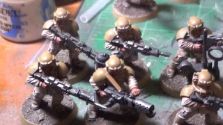 Imperial Guardsmen in desert colors.