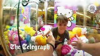 3 year old trapped in Hello Kitty claw machine
