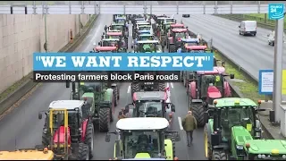 ‘We want respect’: protesting farmers block Paris roads