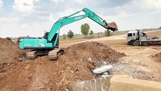 Excavator digging the hole - Nimitt Excavator