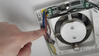 How to replace a bathroom extractor fan (timed), Electrician at work.