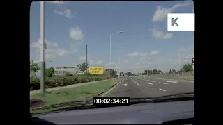 1990s UK, POV Driving Along Motorway Past  London Heathrow Airport, 35mm