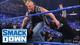 Brock Lesnar confronts and attacks Roman Reigns and Paul Heyman -WWE...