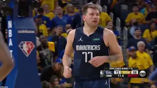 Luka Doncic drops the long triple to end the first half and calm the Warriors crowd down!