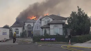 Family Watches Their Home Burn in Wildfires