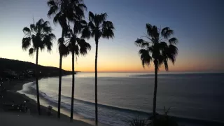 Sun coming out at Laguna Beach California USA Early Sunrise