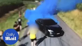 Car catches fire during gender reveal burnout in Queensland