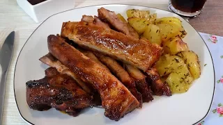 Baked pork ribs with homemade barbecue sauce. Easy and delicious recipe