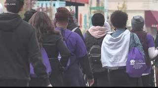 Community walks to raise awareness for domestic violence