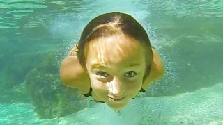 Carla Underwater in a natural swimming pool