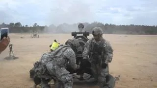 Pro gun crew firing a 105mm howitzer!