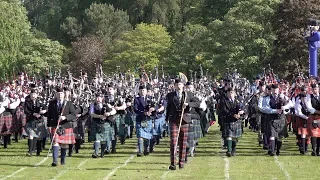 Finale of the 2019 Aberdeen Highland Games in Scotland with parade by the massed Pipes and Drums